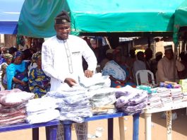 House of Rep Legislative Assistant Distributes School Uniforms, Writing Materials in Iwo