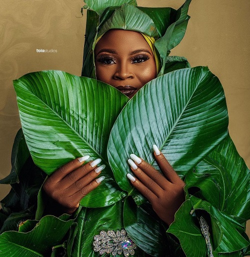 Life Throws me Leaves, I Packed them up and use them to make a Beautiful Dress - Keefah Yetunde