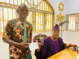 Babalaje Law School Scholarship: Oluwo Presents Grant To Beneficiary, Azeez Ridwan
